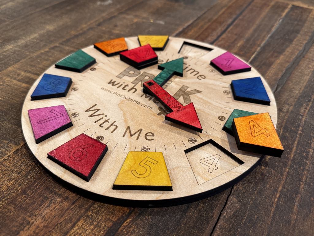 Handcrafted Teaching Toy Clock, perfect for Pre K and Preschool. Merges Pre Math and a Number Puzzle to build fundamental skills. Reinforces counting 1-10, shape recognition, and fine motor skills with color-coded numbers and shapes and makes learning math fun.